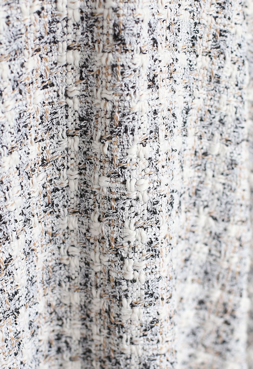 Robe mi-longue en tweed texturé à bords bruts