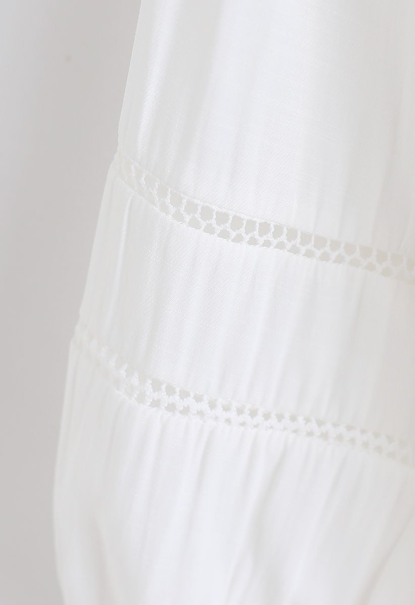 Chemise boutonnée à cordon de serrage en blanc