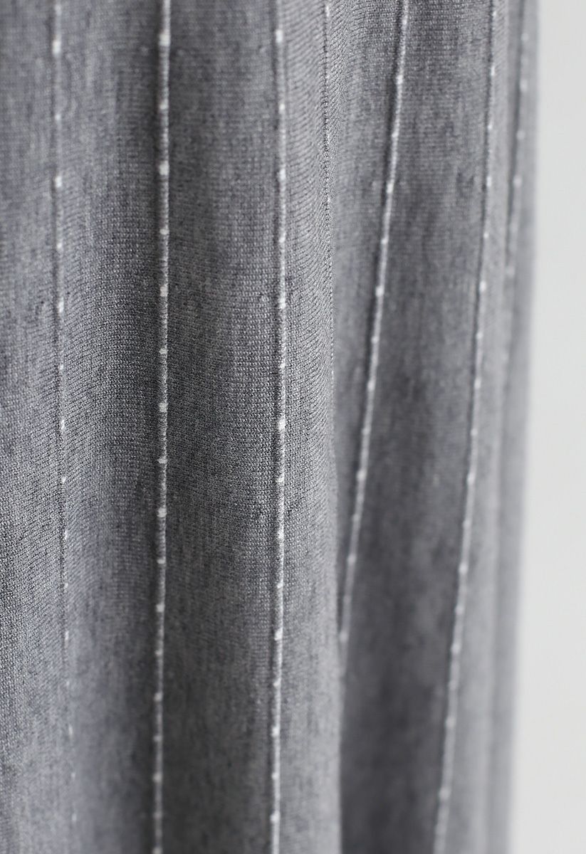 Jupe mi-longue trapèze en maille rayée en gris