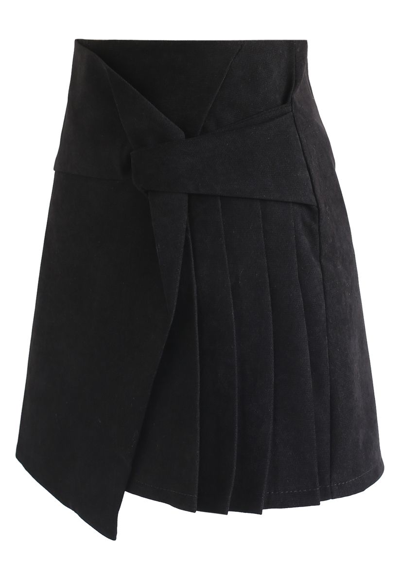 Mini jupe plissée à rabat en noir