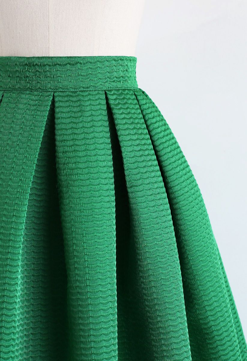 Jupe mi-longue plissée à texture ondulée en vert