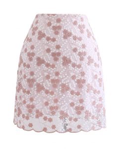 Mini-jupe en maille fleurie brodée