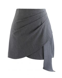 Mini-jupe asymétrique plissée froncée en gris