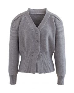 Cardigan en tricot boutonné à manches bouffantes en gris