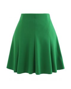 Mini-jupe évasée à ourlet brut en vert
