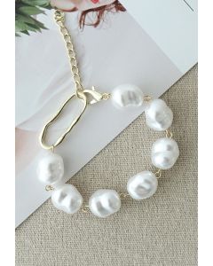 Bracelet perlé blanc irrégulier
