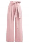 Pantalon large plissé avec ceinture à nœud papillon en rose