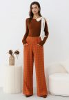 Pantalon coupe droite à imprimé quadrillage et boutons décoratifs en orange