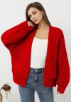 Cardigan ouvert sur le devant en tricot épais à poches plaquées, en rouge