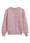 Pull en maille torsadée avec motif cœur en relief en rose clair