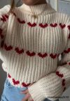 Pull tricoté à la main avec rangées de coeurs