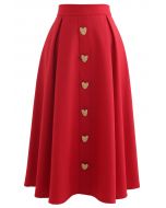 Jupe mi-longue trapèze ornée de boutons en forme de cœur en rouge
