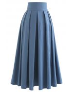 Jupe mi-longue plissée en coton bleu