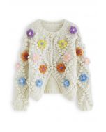 Cardigan boutonné en tricot fleuri à pompons