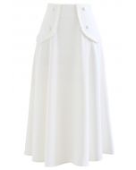Jupe évasée plissée avec fausse poche en blanc