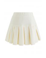Mini jupe évasée plissée à taille élastique en crème