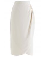 Jupe mi-longue tulipe plissée sur le côté en ivoire