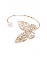 Bracelet jonc perle papillon évidé en or