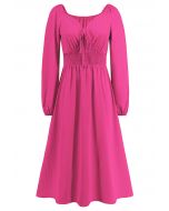 Robe mi-longue nouée sur le devant à col en cœur, magenta