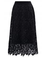 Jupe mi-longue en tricot superposée en dentelle découpée en noir