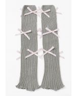 Jambières en tricot à décor de nœud papillon en gris