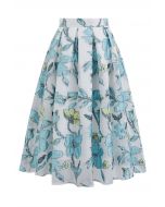 Jupe mi-longue plissée en jacquard floral printanier en bleu