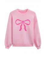 Pull en tricot jacquard à motif ruban et nœud papillon en rose