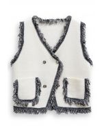 Gilet en tricot à double boutonnage avec bordure à franges en blanc