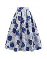 Jupe midi plissée évasée en jacquard fleuri orné de motifs indigo