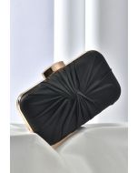 Pochette en satin froncé et noué en noir