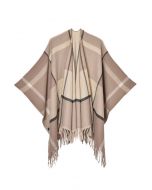 Poncho à ourlet frangé à motif géométrique en beige