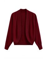 Cardigan minimaliste en tricot côtelé ouvert sur le devant en rouge