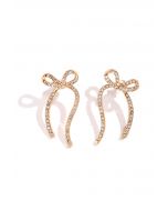 Boucles d'oreilles en forme de nœud avec strass en or