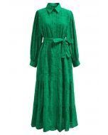 Robe mi-longue boutonnée à taille nouée et broderie délicate à œillets en vert