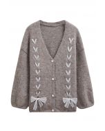 Cardigan en tricot pelucheux à lacets avec ruban en dentelle taupe