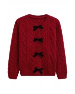 Cardigan en tricot tressé avec boutons-pression et nœud papillon en rouge