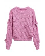 Pull en tricot texturé géométrique à nœud ludique en rose