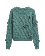 Pull en tricot texturé géométrique à nœud ludique en vert