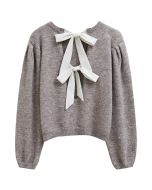 Pull en tricot à manches bouffantes et nœud dans le dos en taupe