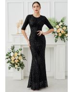 Robe sirène opulente à sequins géométriques en noir