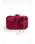 Pochette en satin noué et froncé en bordeaux