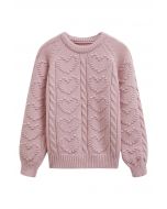 Pull en maille torsadée avec motif cœur en relief en rose clair